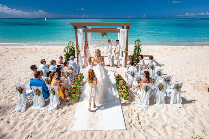 Red dress beach wedding