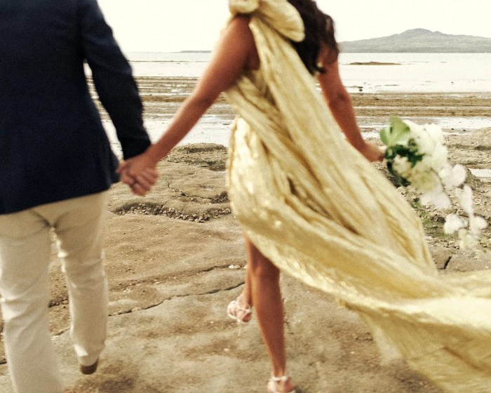 Red dress beach wedding