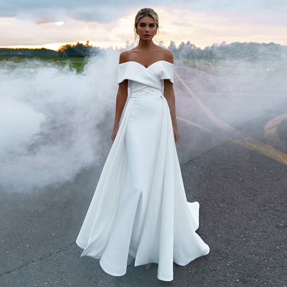 Plus size wedding dress with detachable skirt